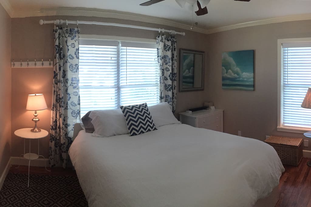 Guest bedroom with Queen size Tempur-Pedic mattress (sleeper sofa was upgraded to a bed).
Bedroom faces large front yard with expansive lawn and trees. Bed includes 6 pillows and down comforter.