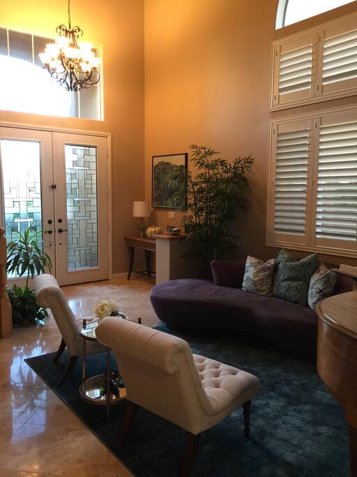 Beautiful spacious entry with leaded glass doors