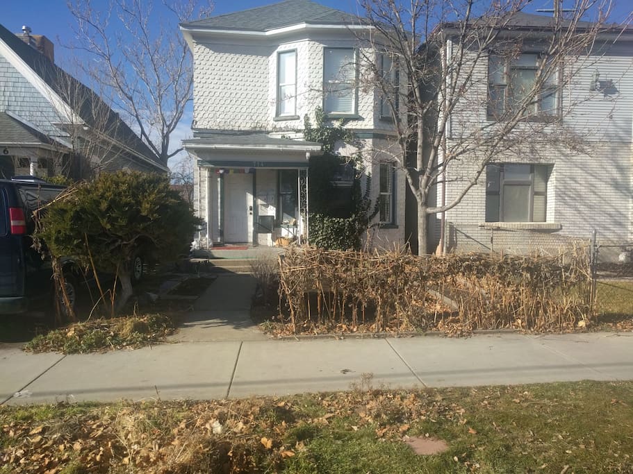 You will be using the driveway to the left to access the apartment through the back door