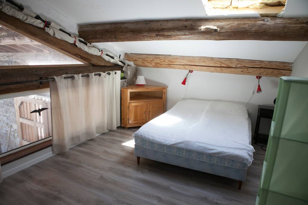 Bedroom 1 with double bed and skylight