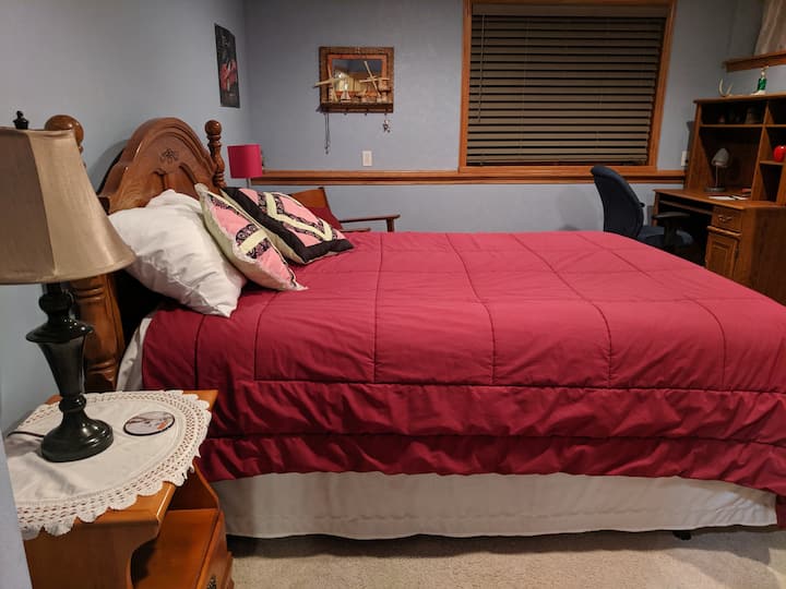 Bedroom #1 - Queen bed, desk, office chair, fan
