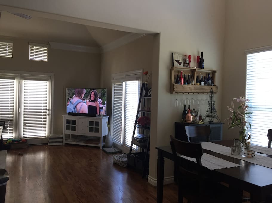 View into the living room and dining room area.