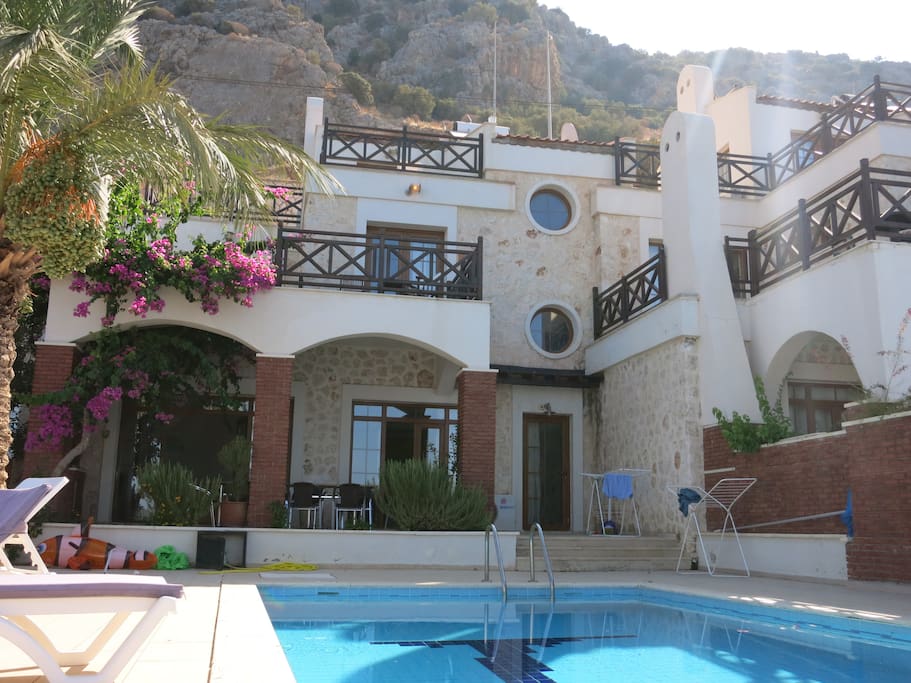 A beautiful luxury villa with 4 bedrooms, each with private balconies, set over 3 floors