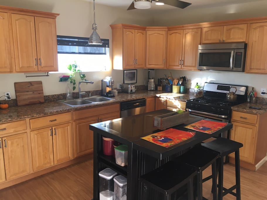 Modern kitchen with eat in island.