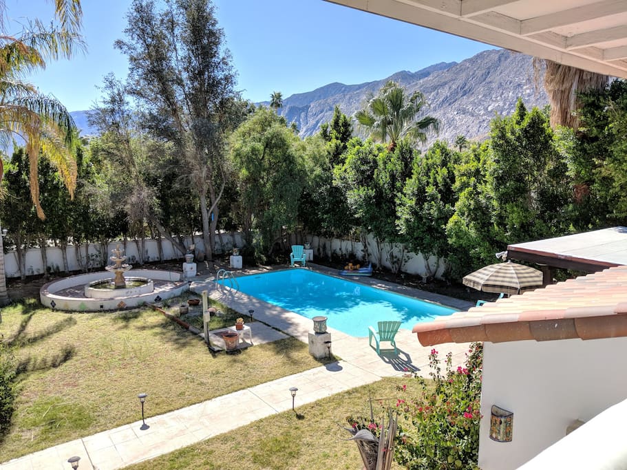 View of the front yard and mountains taken from the rooftop patio