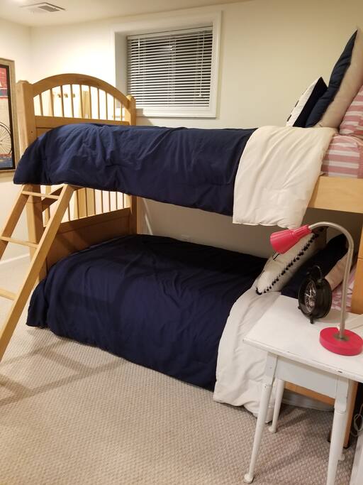 Bunk beds are located in an adjacent area to the living/dining space, complete with room divider for privacy. We can accommodate a fifth person with a comfy foam mattress, if needed.