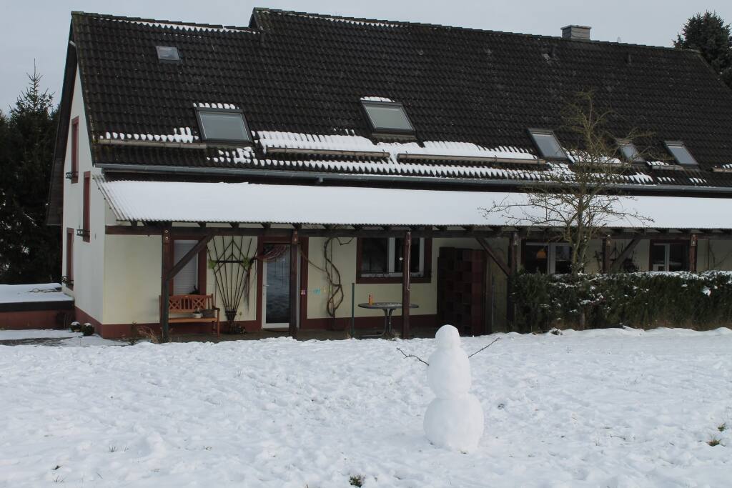 De ingang aan de achterzijde