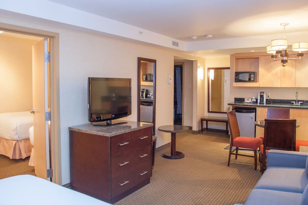 Our Family Suite features a queen & two single beds, sofa bed, dinning table, 2 Tvs and much more.