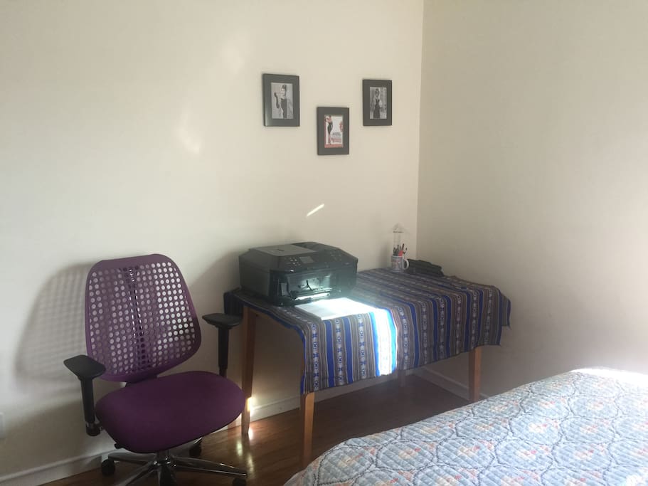 Desk with office chair and printer