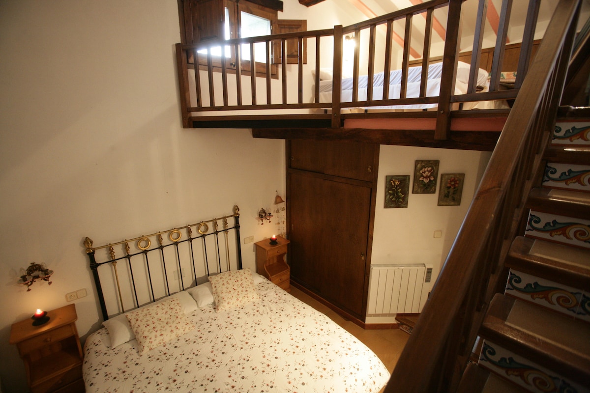 family room with loft. Sleeps 4 - 5 people. Bedroom-beat space at Can Manyol in Santa Pau