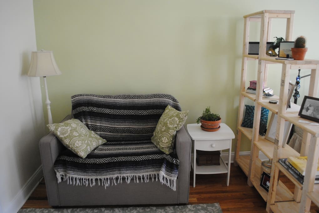 The love-seat is also a sofa bed that can accommodate a third guest!