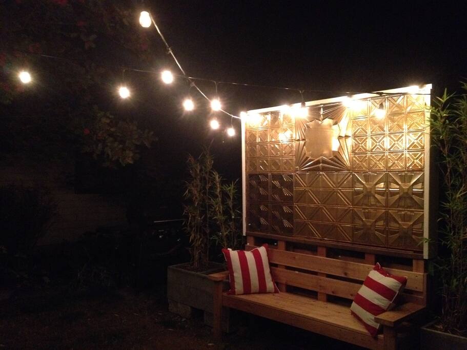 The privacy screen also provides another outdoor seating area.