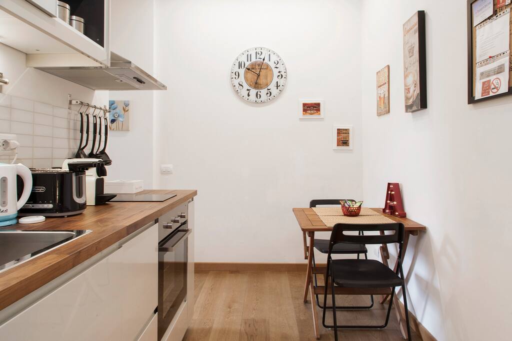 The equipped Kitchen & The dining table