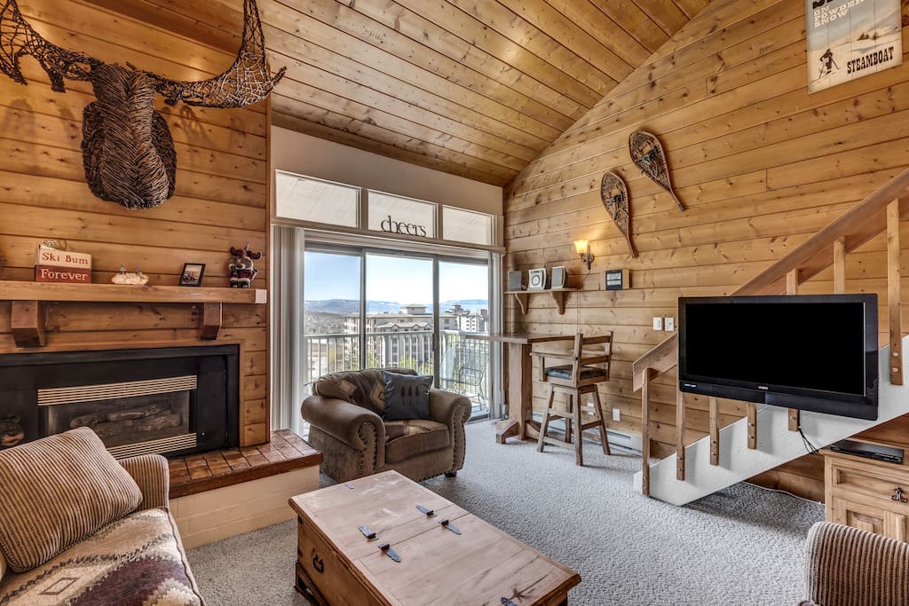 Gas fireplace and flat-screen TV in the living room.