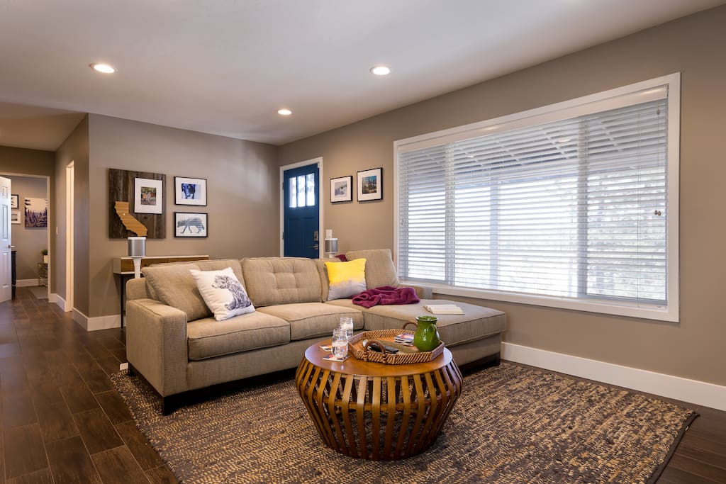 There is plenty of seating in the living room to enjoy the HDTV or the gas fireplace.