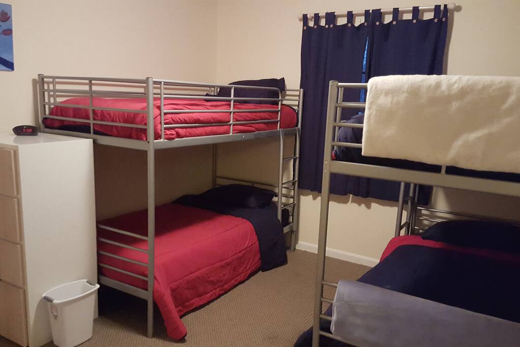 Bunk room with 4 single beds