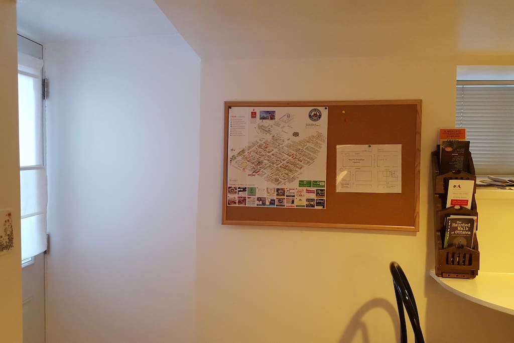 The entrance has a map of the area and may tourism brochures and restaurant menus.