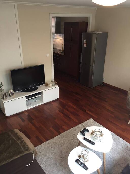 Living room. TV with Playstation 4 and cable TV is available.