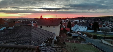 Apartment with balcony and garden view near the forest