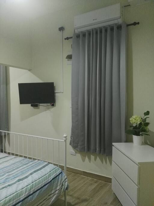 Bedroom equipped with air conditioner