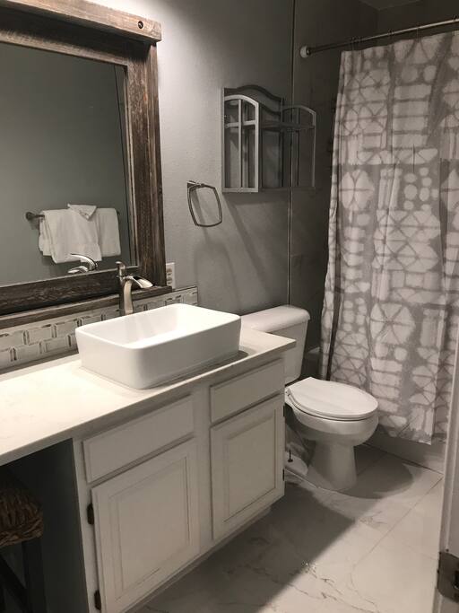 New bathroom with up to date tile.