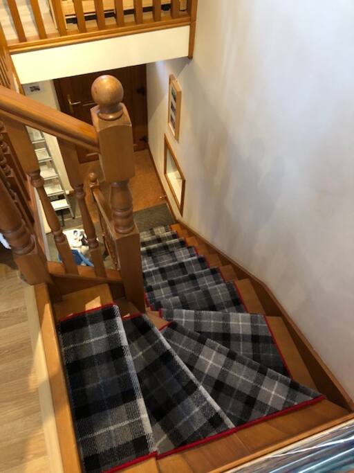 Upstairs view to front door way.