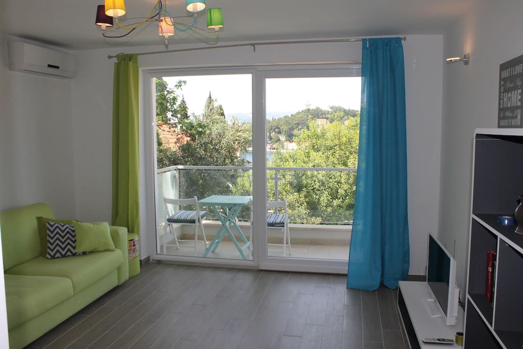 Charming lounge area with sat TV and A/C