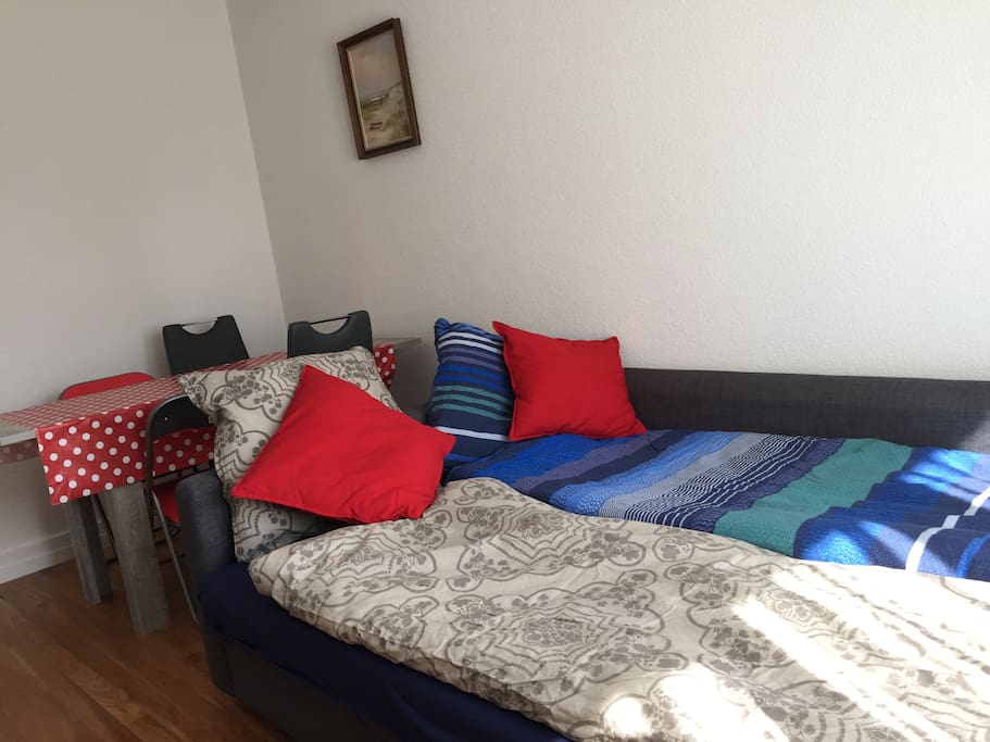 Bettsofa im Wohnzimmer.