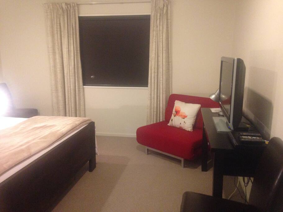 Your room with TV and opening window. Garden view.
