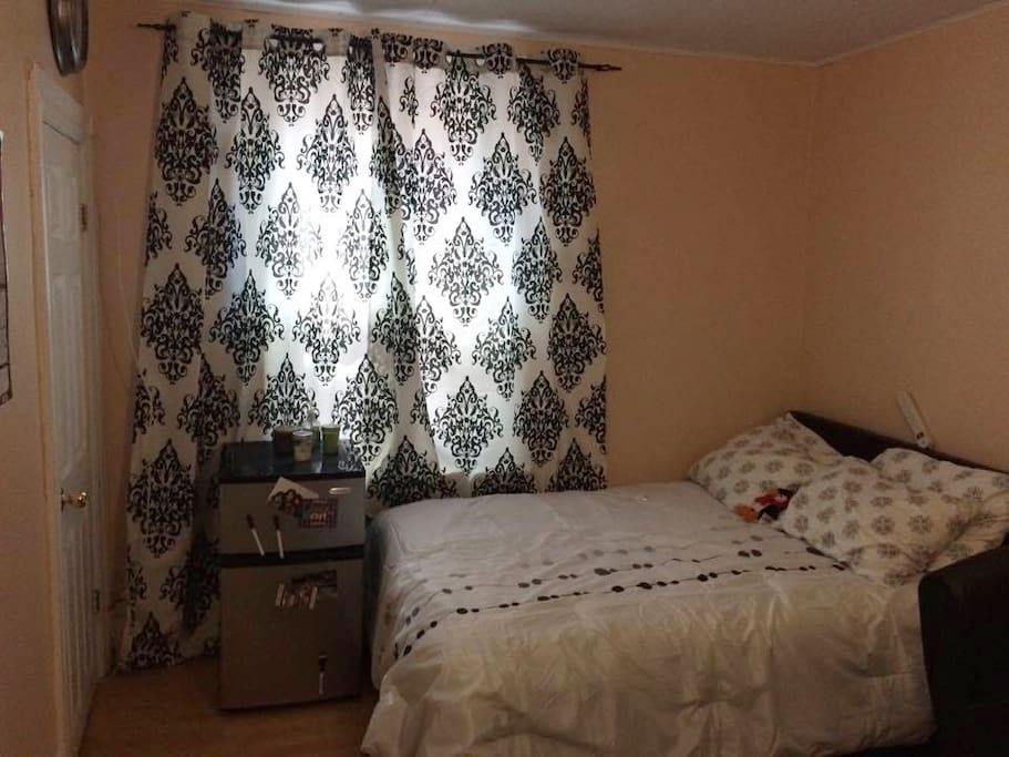 Room with double bed and desk for work space if needed.