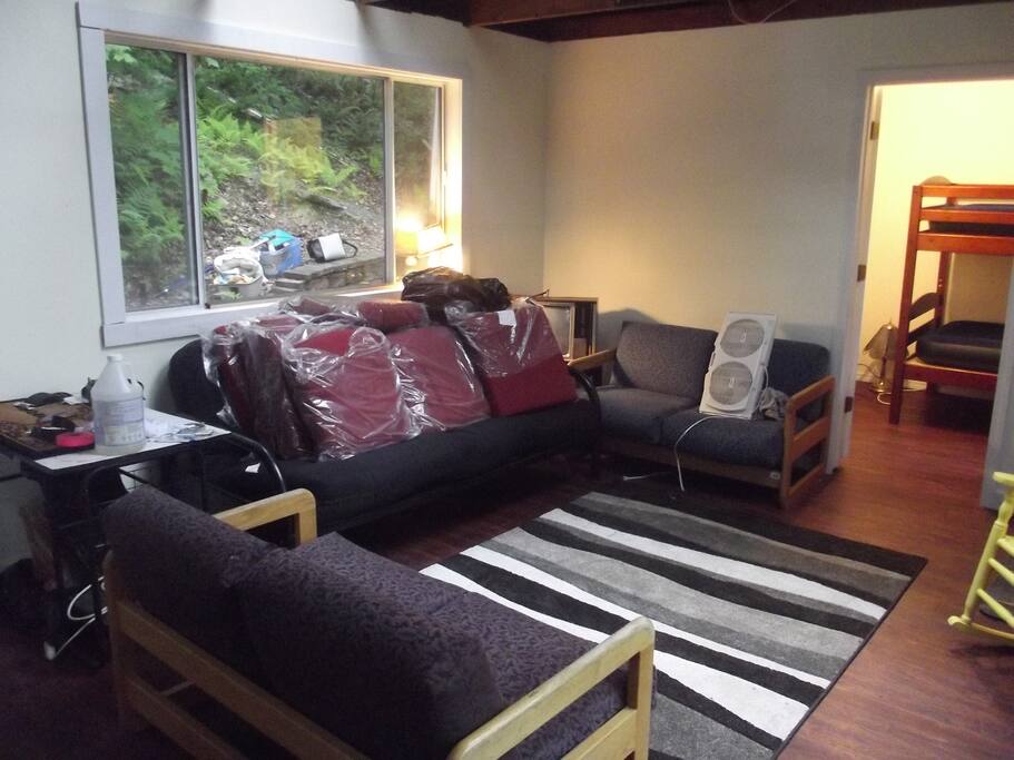 Living Room looking towards air-conditioned bedroom. Cottage is close to all the attractions of the Dartmouth Lake Sunapee Area.