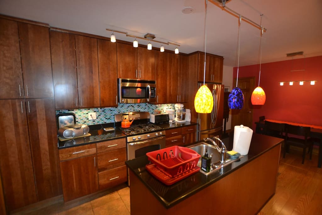 Full kitchen with dishwasher, microwave and all necessary cooking utensils