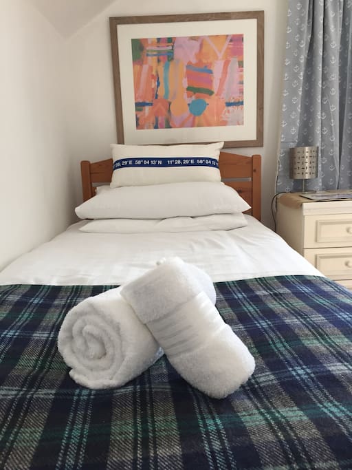 Beds with fresh linen & towels.