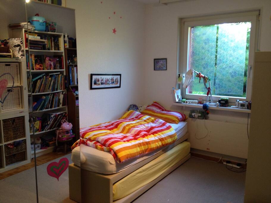 In single setup you have a full length adult bed with plenty of space in the room. The mattress is excellent quality. The shelves are filled with my 9 year old daughters toys and books (English, Spanish and German)