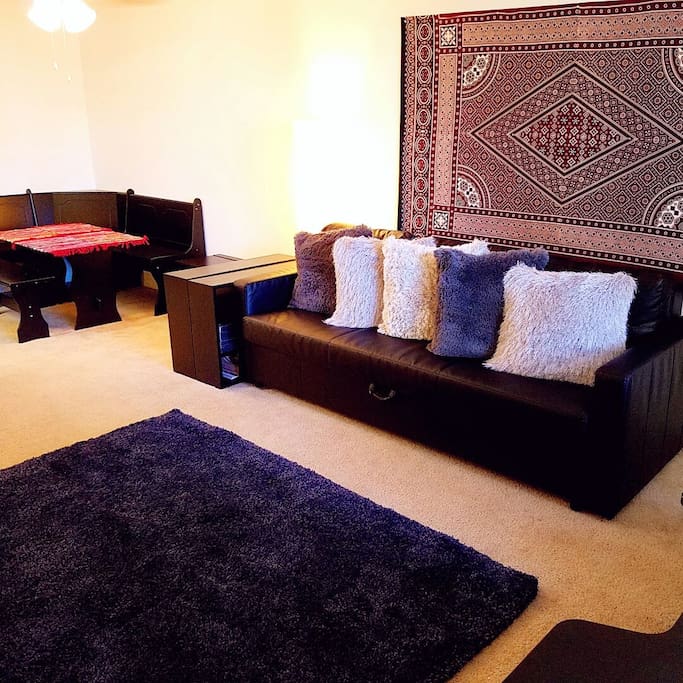 The bed is in sofa form here.