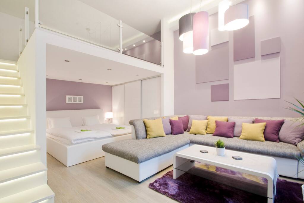 view of the sleeping corner and the sofa in the living room