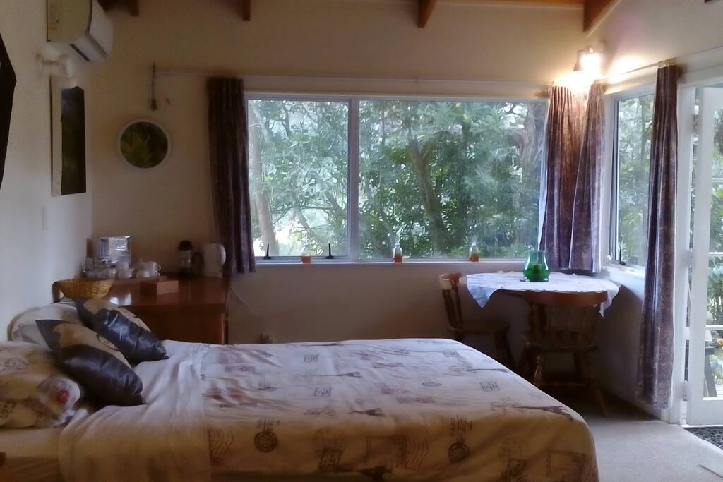 double bed. air conditioning, seating area