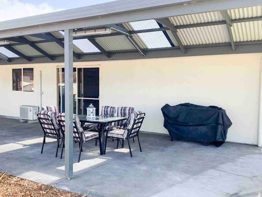 Large pergola with bbq and outdoor setting