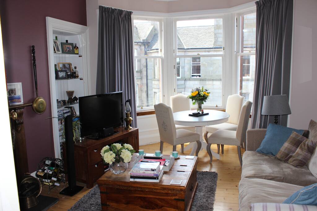 Bright living room with dining table
