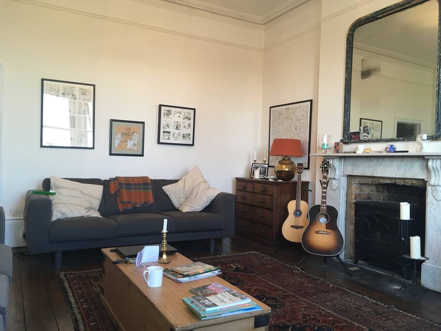 High Ceiling large Lounge with 2x 3 seater Sofas
