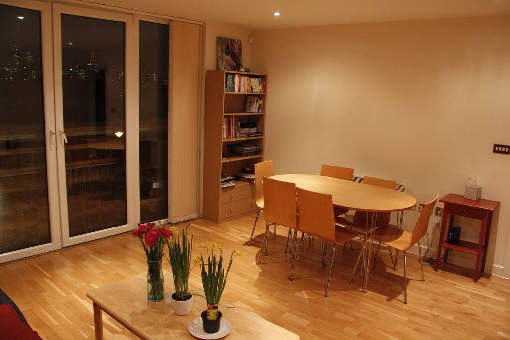 Main living and dining area with view out to the City of London