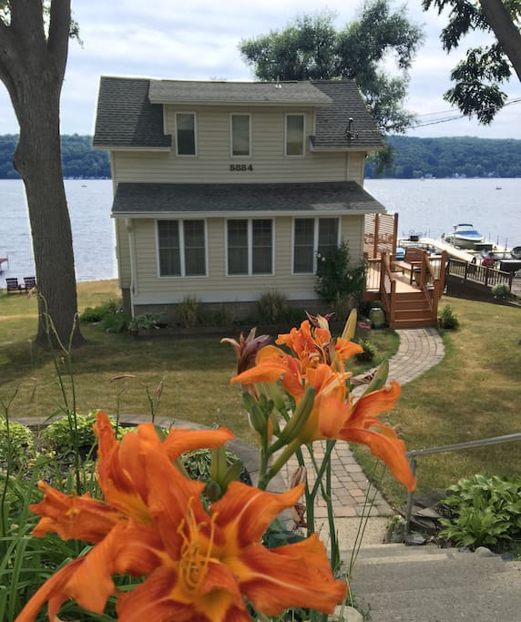 Newly updated 3-story home is tucked away for a private lakefront getaway.
