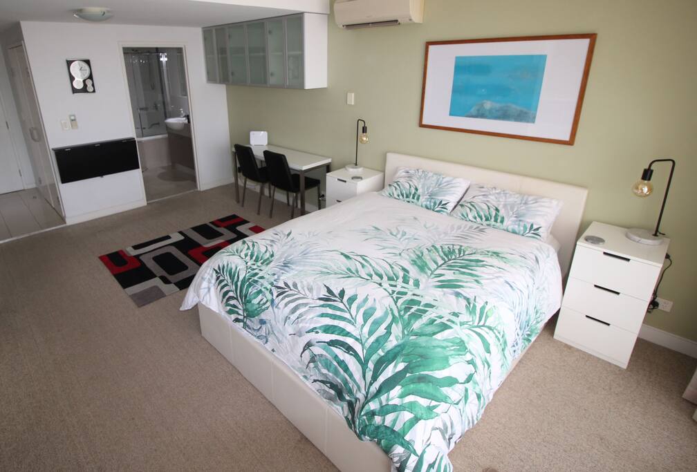 Queen size comfortable bed, work area that converts to a good size dining table ( folds out ). Extra bench space and plenty of storage
