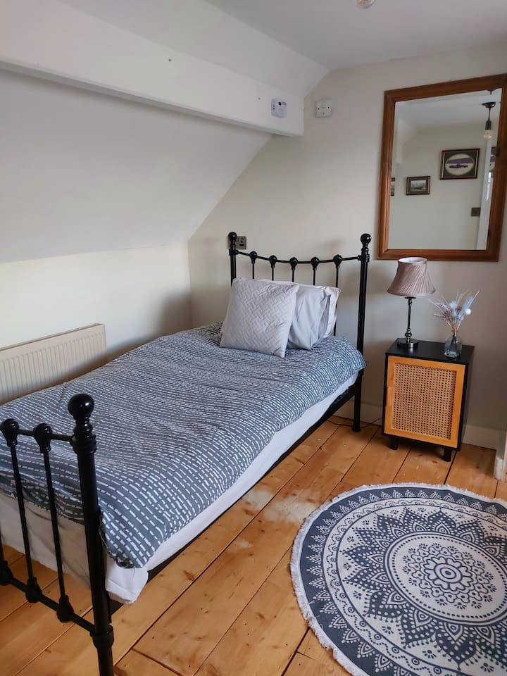 Habitación con 2 camas individuales