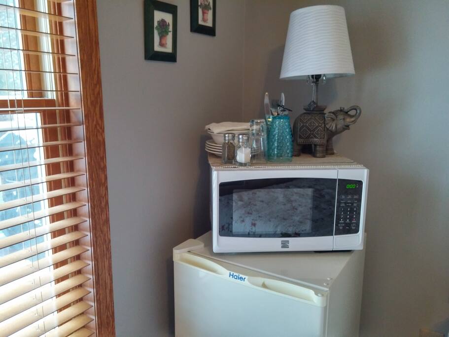 Your also have a microwave and mini-fridge, and plenty of dishes and silverware. The mini-fridge is stocked with milk for your cereal, butter, and a selection of juices.