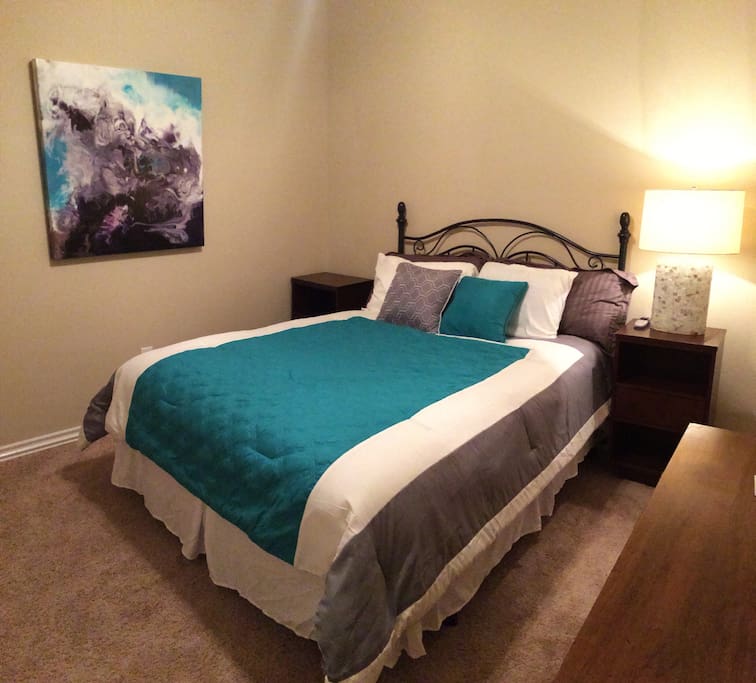 The second guest room with another queen bed!