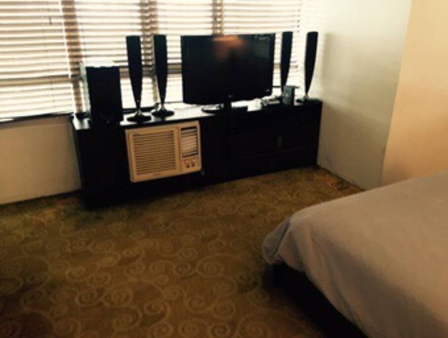 Aircon and TV with cable at the Master's Bedroom