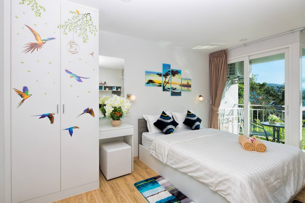Comfortable bedroom with private balcony