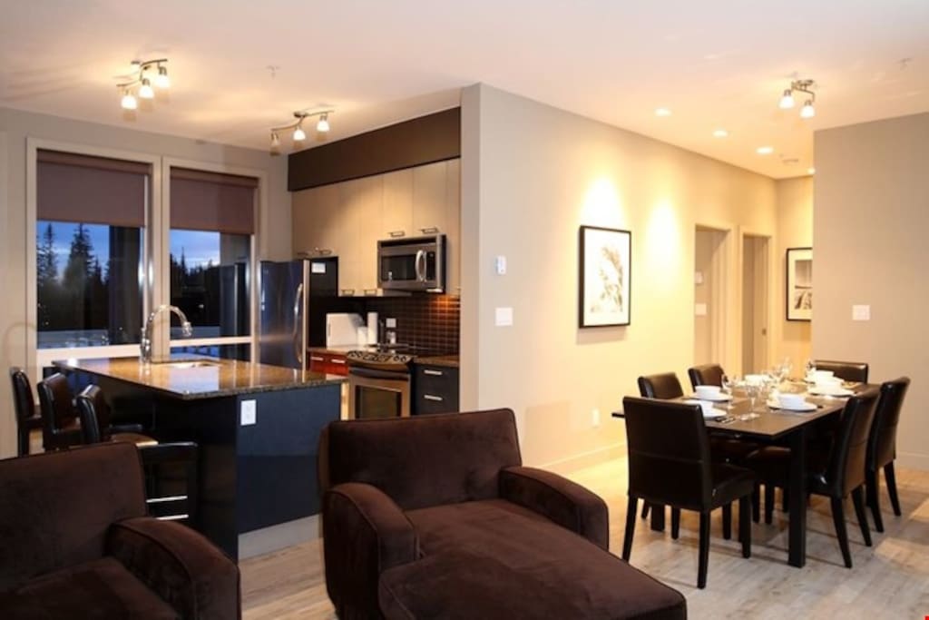 Enjoy meals together at the large dining table with seating for everyone.
