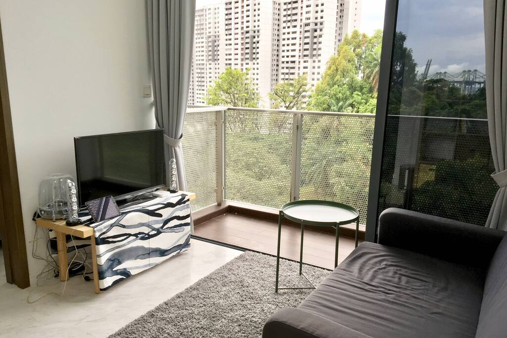 Living Area - bright, modern design with a great view!